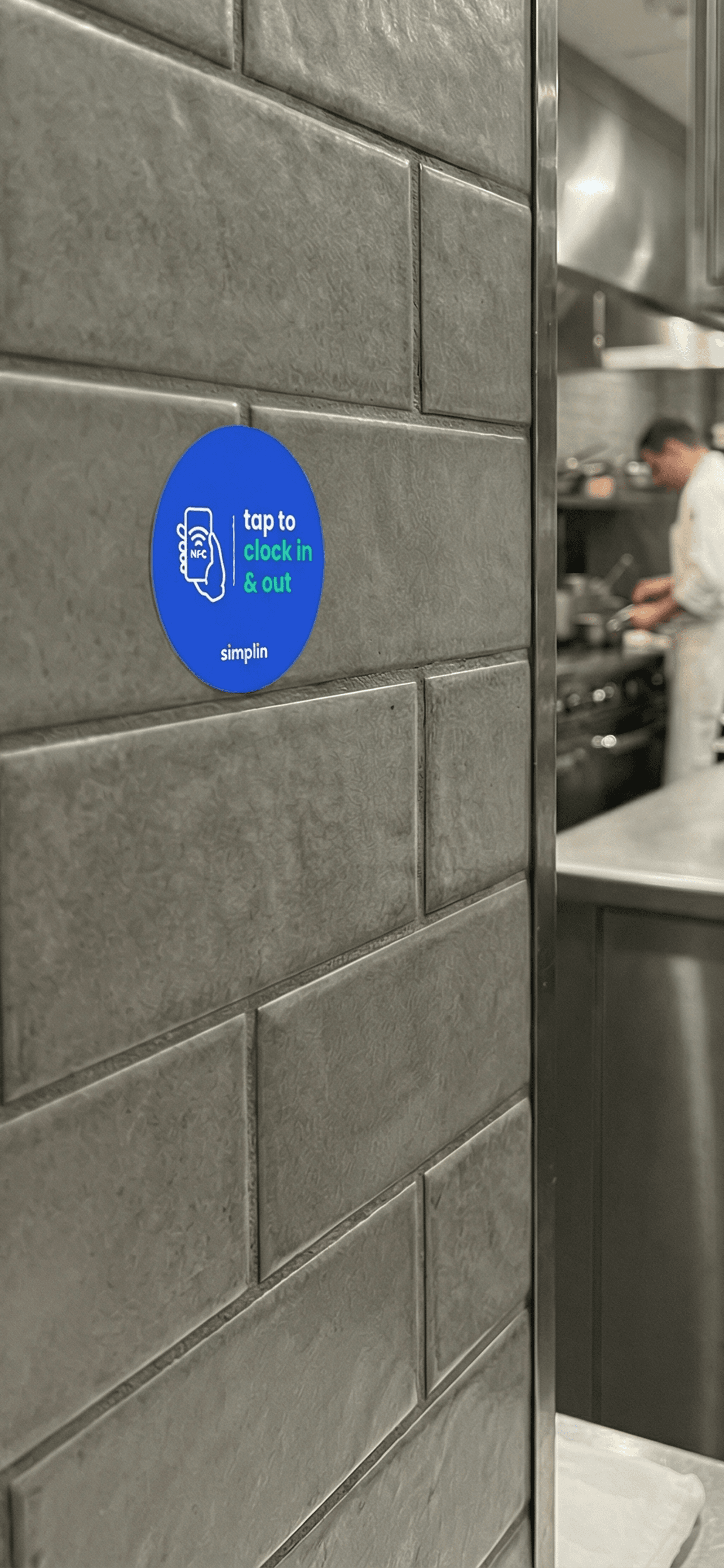 Simplin NFC sticker on a restaurant wall